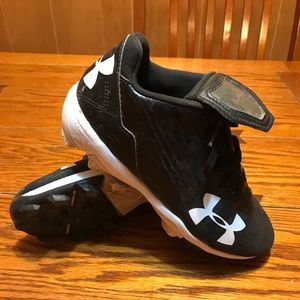 Size 1.5 Under Armour cleats
